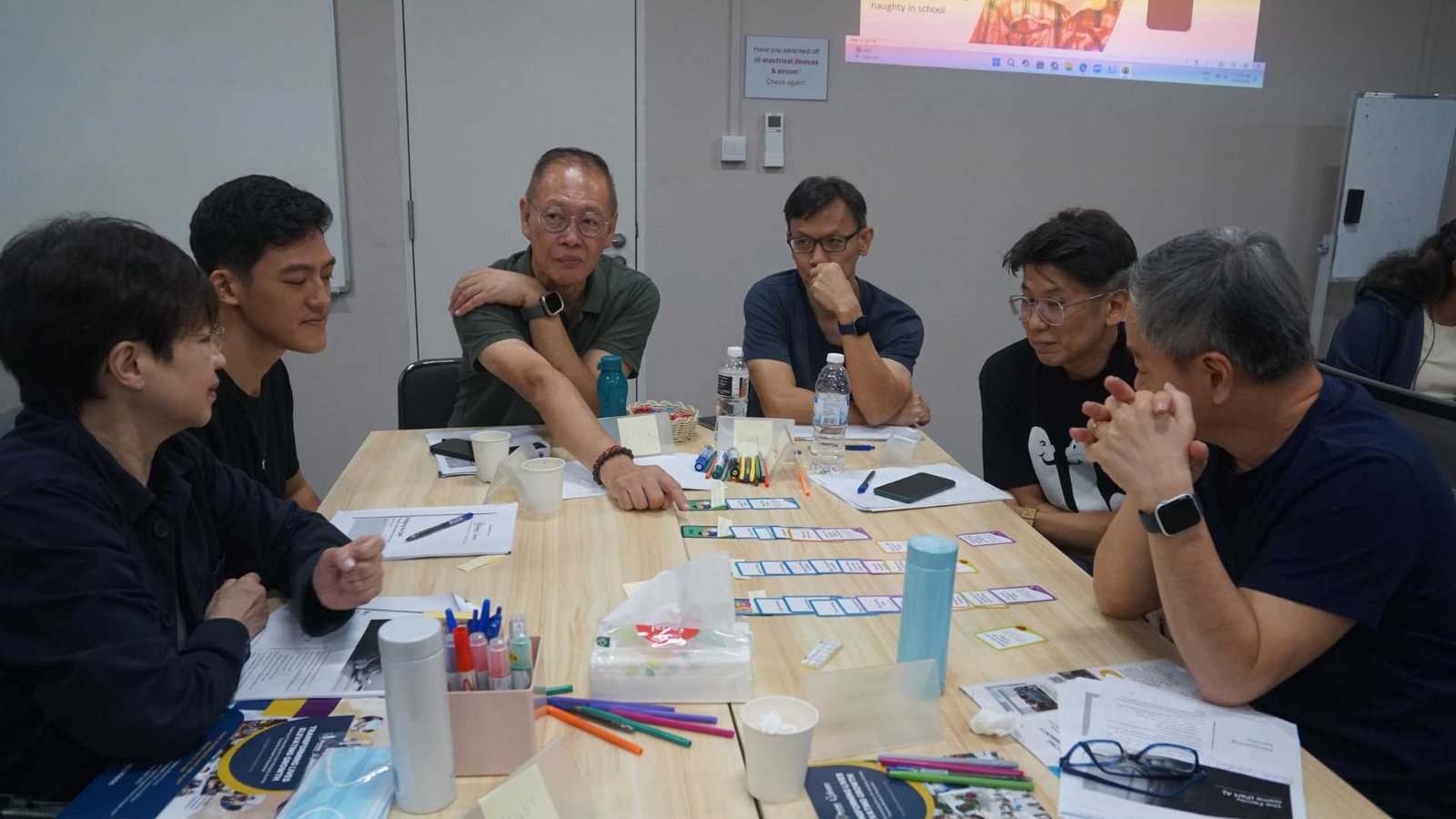 Community members and volunteers learning through shared lived experiences