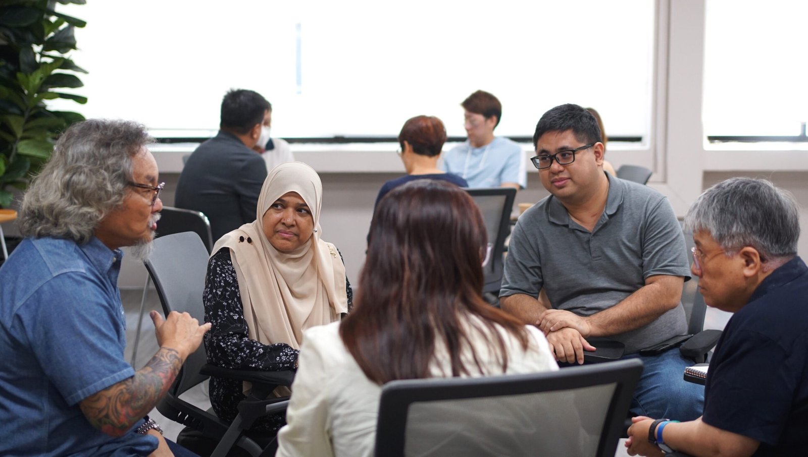 Participants practising helping and communication skills together