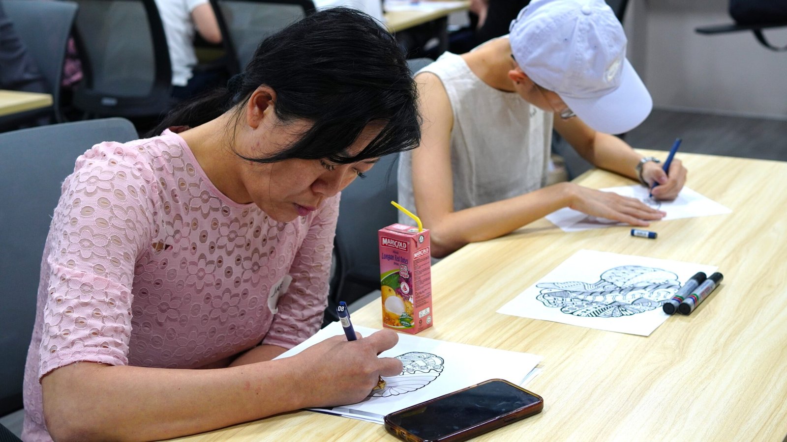 Community members taking part in a learning activity